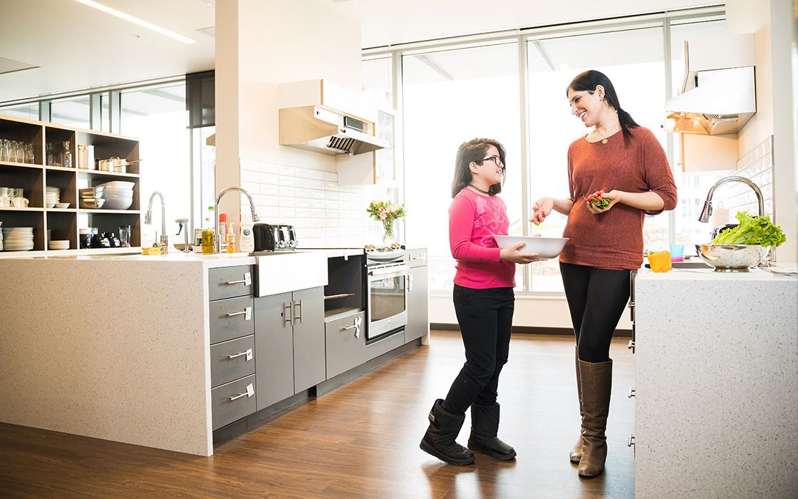 a kitchen, dining and play area for families of pediatric patients