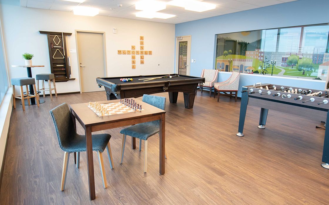 A room with foos ball and other games