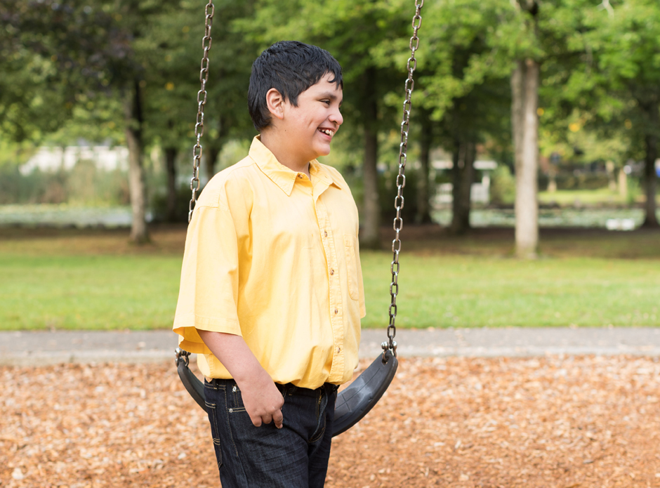 Macario at the swingset