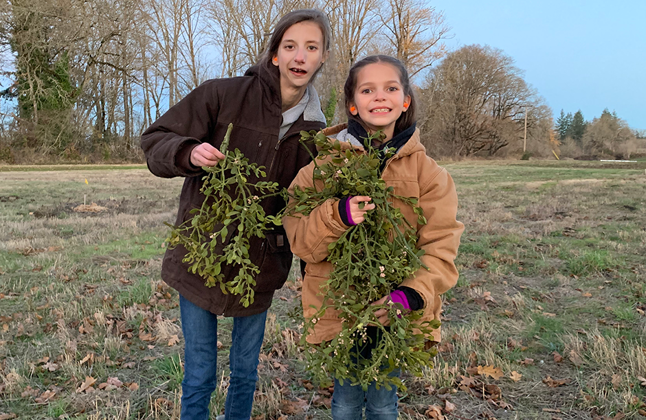 Elle and Cora after a day of harvesting misteltoe