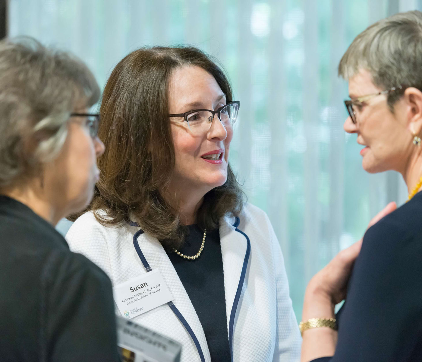 Dean Susan Bakewell Sachs meets with alums of the School of Nursing