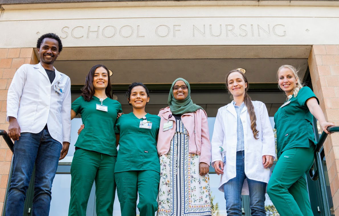 A group of students outside the School of Nursing building in Portland