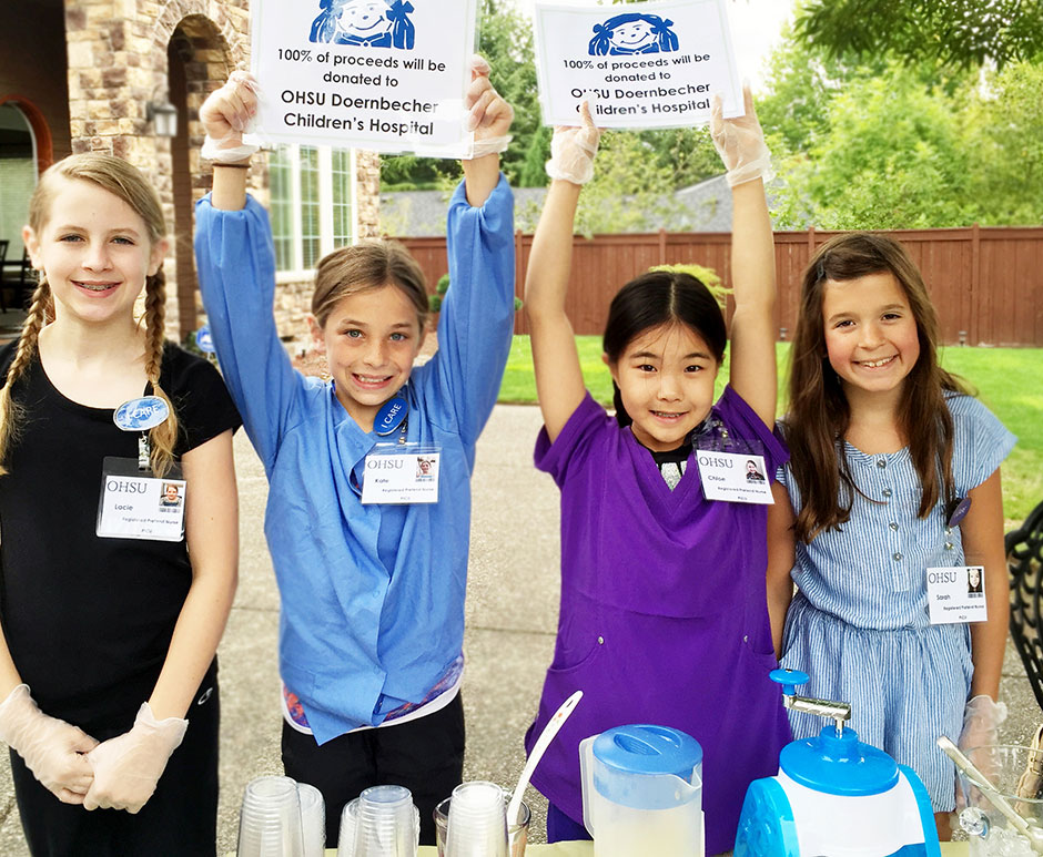 Little girls selling lemonade