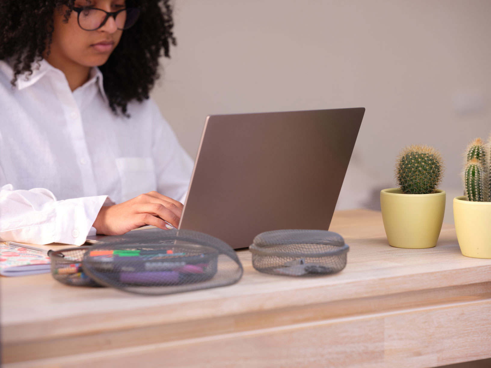 hip woman using sleek laptop