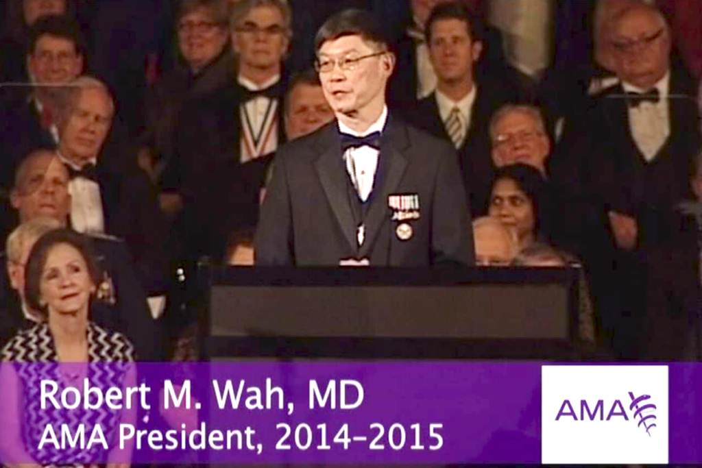 Robert M. Wah, M.D. speaking as president at the American Medical Association