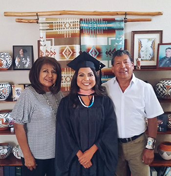 Lenora Waconda stands with her parents, John and Deanne Waconda.