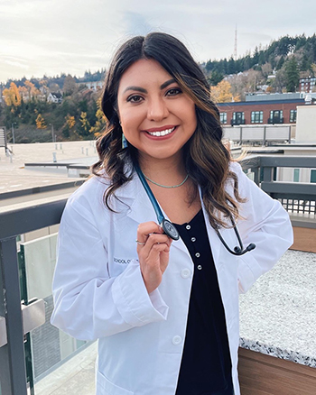 Lenora Waconda wearing a white coat