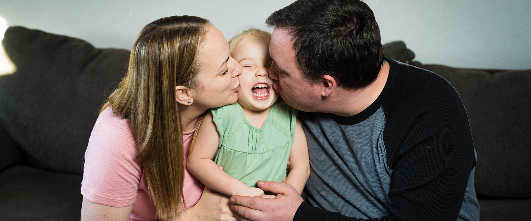 Brittney and Austen Goss and their daughter, Harley