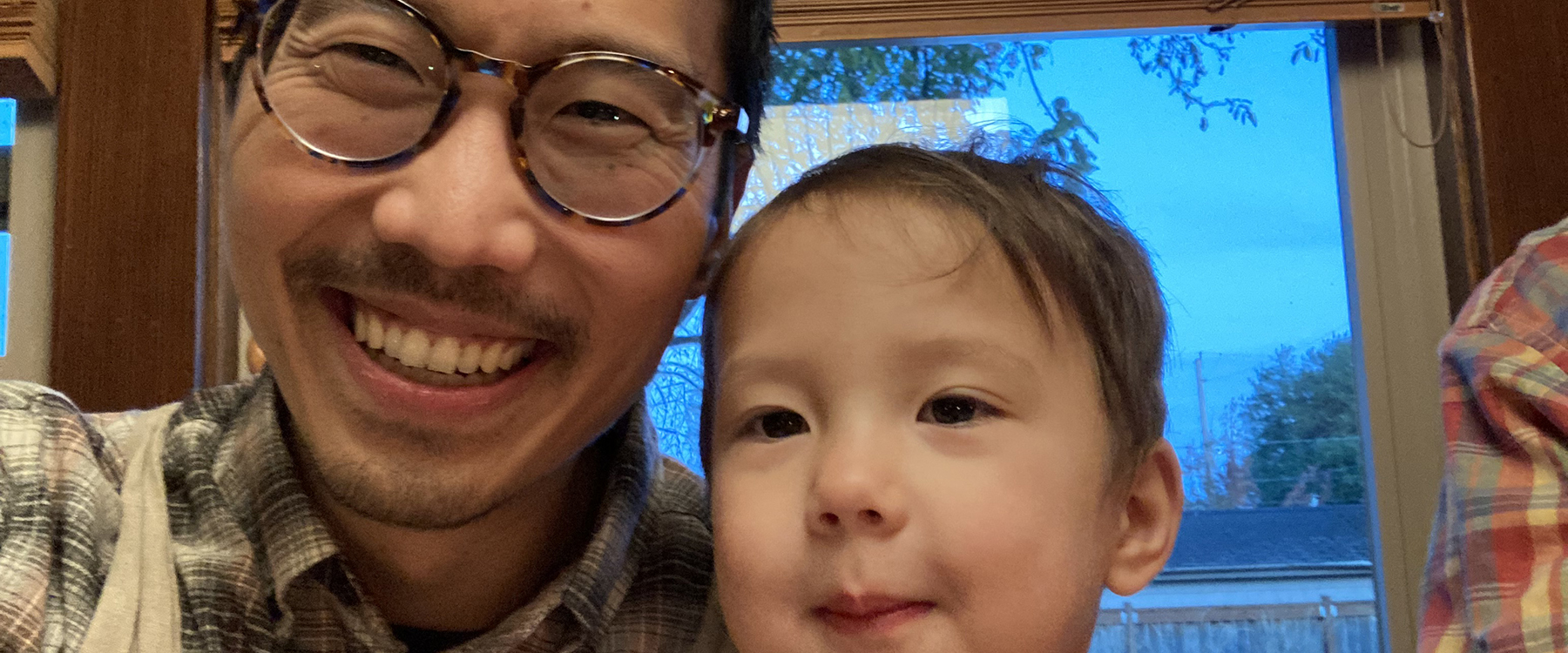 Brian Park and his child, Miles