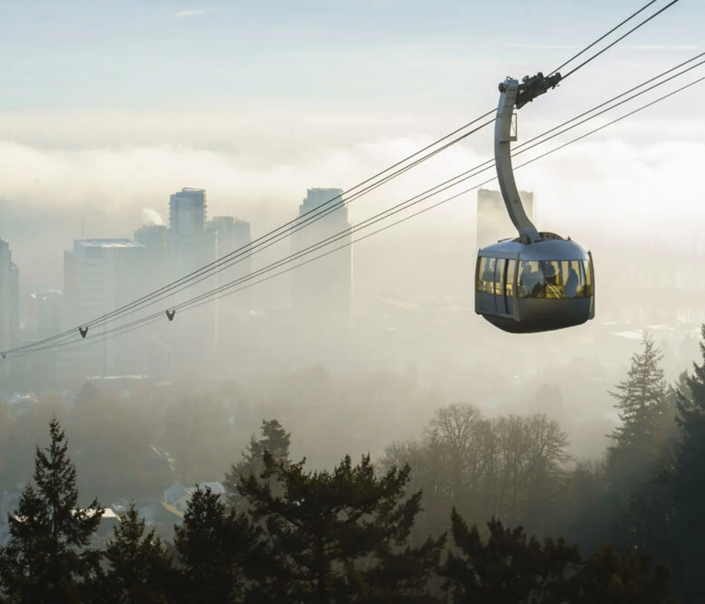 OHSU tram in the fog with waterfront campus in the background