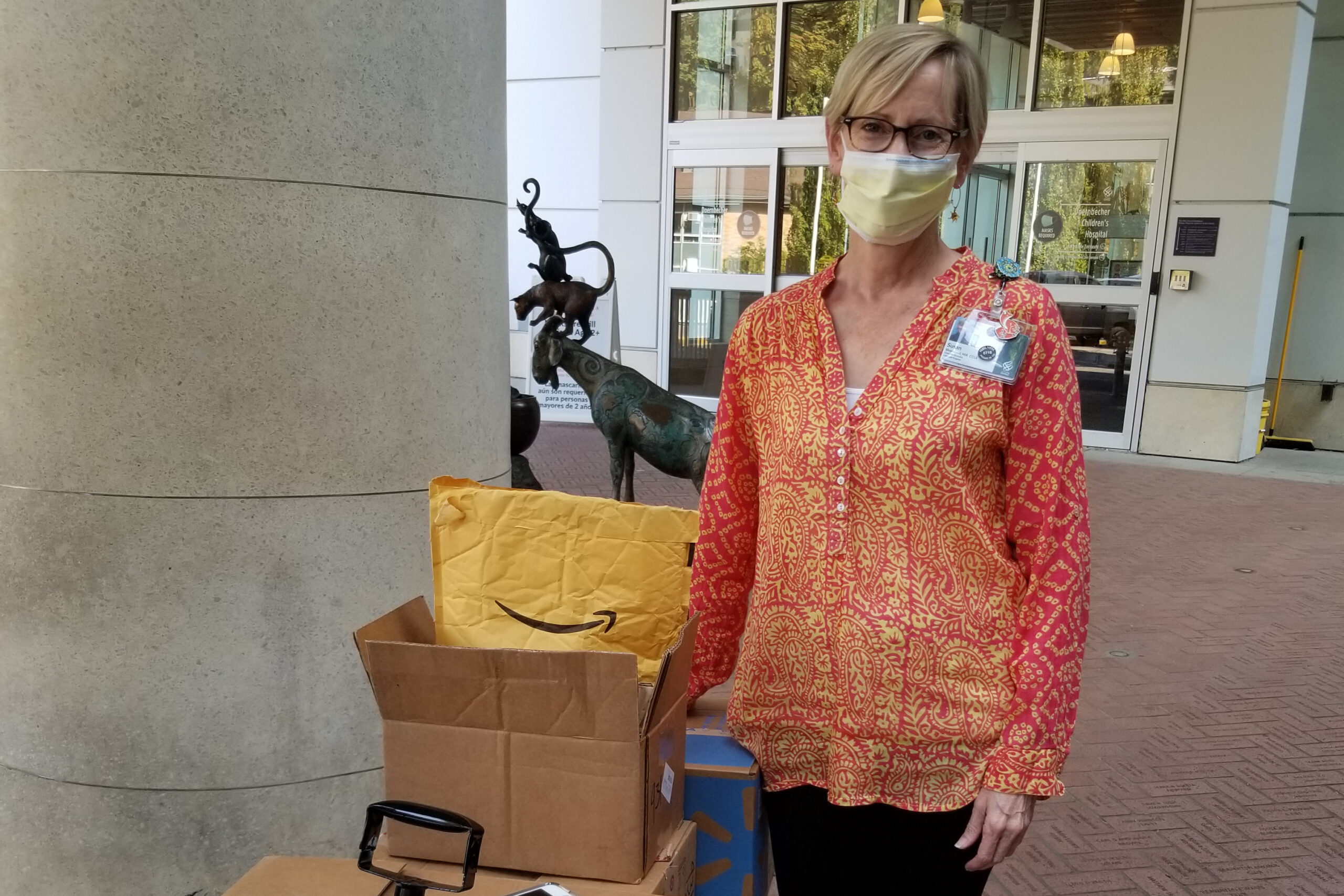 Susan Sherwood with donations from the nonprofit
