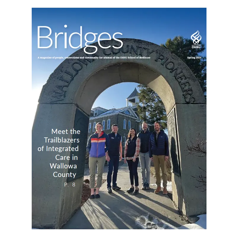 School of Medicine Bridges magazine front cover, 2024 spring issue, five people standing under a stone arch.