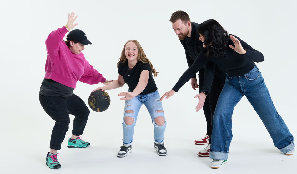 Jillian plays basketball against her Nike design team in the studio during a photo shoot for Doernbecher Freestyle 20. 