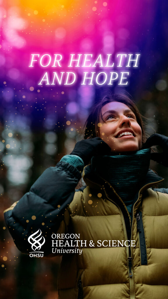 Woman in puffer jacket outdoors smiling up at the sky