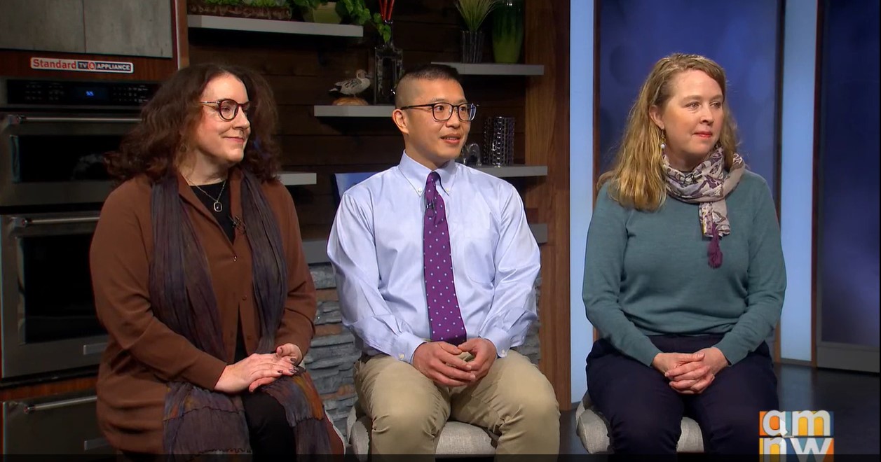 Three people being interviewed in studio on the TV show AM Northwest