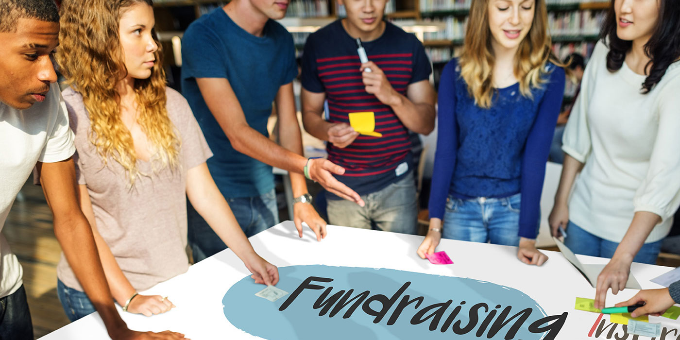 high school students brainstorm about fundraising