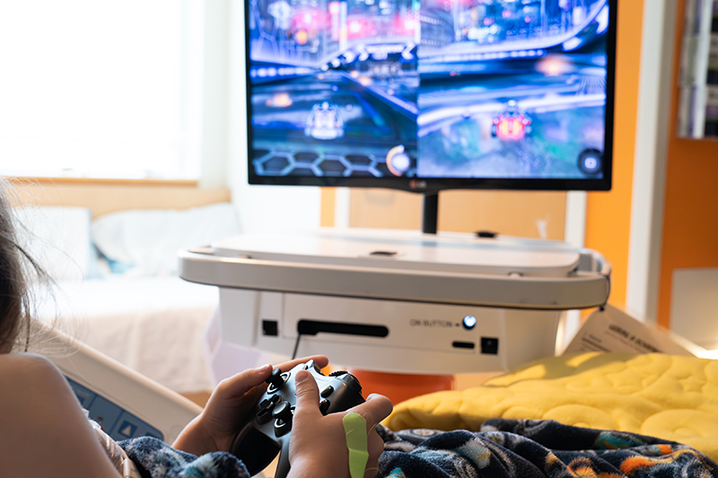 A patient at Doernbecher playing a video game.