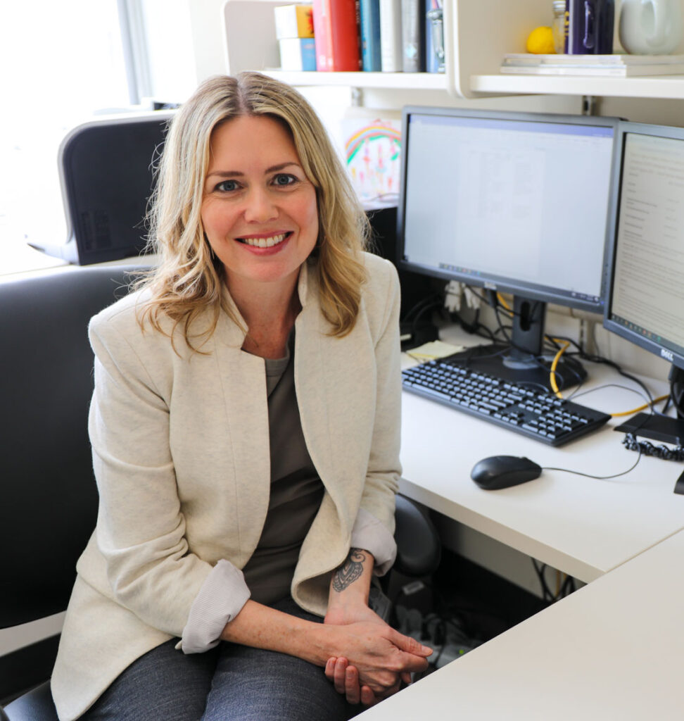 Bonnie Nagel, Ph.D., at her desk at OHSU