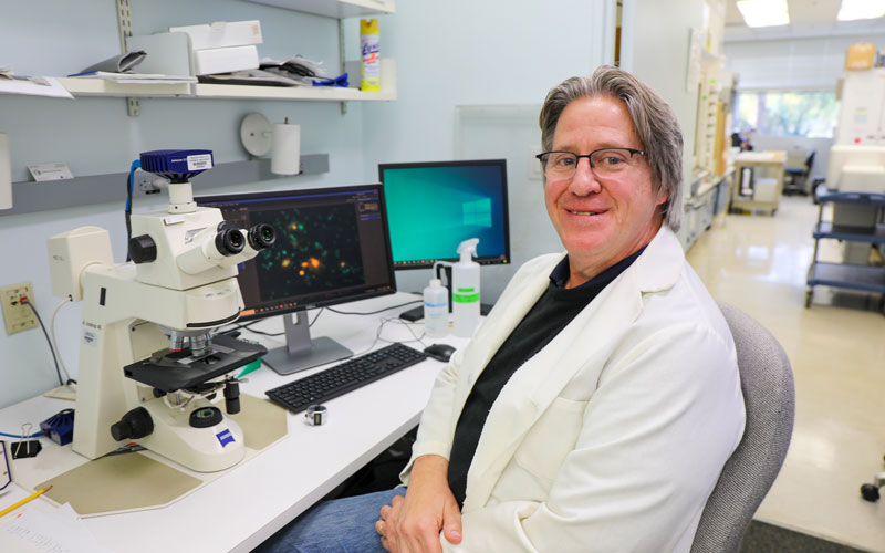 Larry Sherman, Ph.D., in his lab