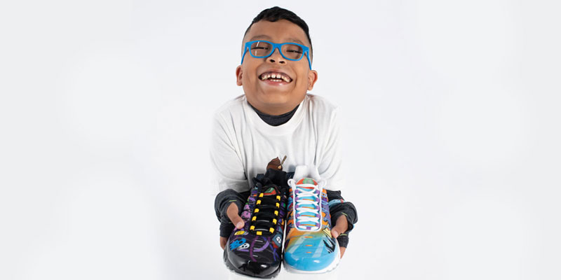 Sergio holds his Freestyle shoes